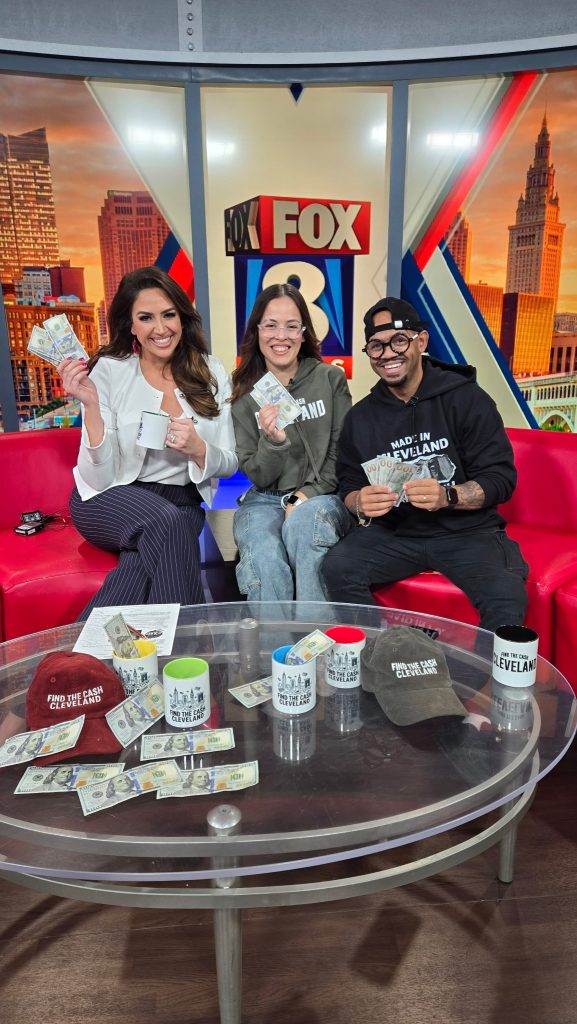 FOX 8 News feature showing Find the Cash Cleveland founder Khristian Santana during a live broadcast about Cleveland’s citywide cash drop challenge
